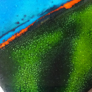 Zoom sur la partie de couleur verte de la création de l'artisan d'art.